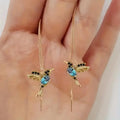 Long hanging bird design earrings for women with mixed zirconium wings, in red, blue, or red lvzuan.
