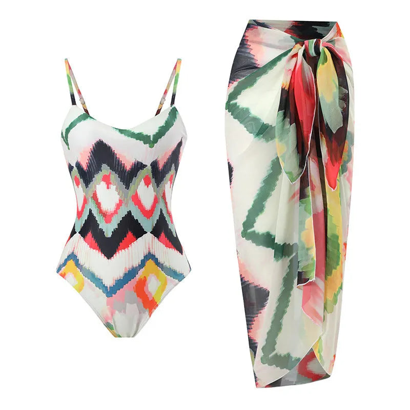 Women's gradient striped swimsuit set with matching hip skirt in polyester fabric