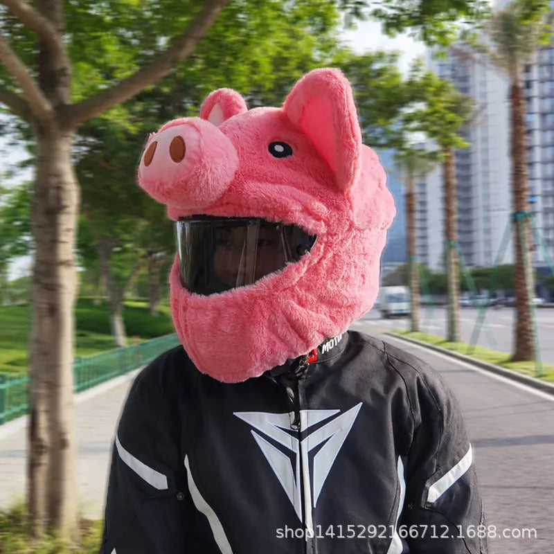 Pink pig cartoon plush helmet protective hood for motorcycle helmets with matching sleeve.