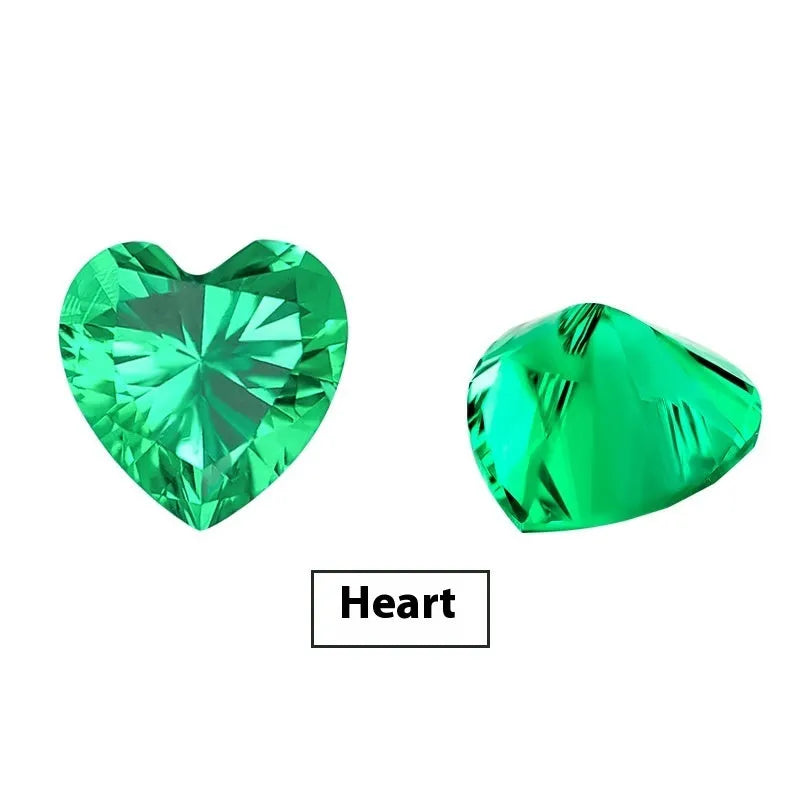 Loose cultivated emerald gemstone in Columbia green treasure colour on a white background.