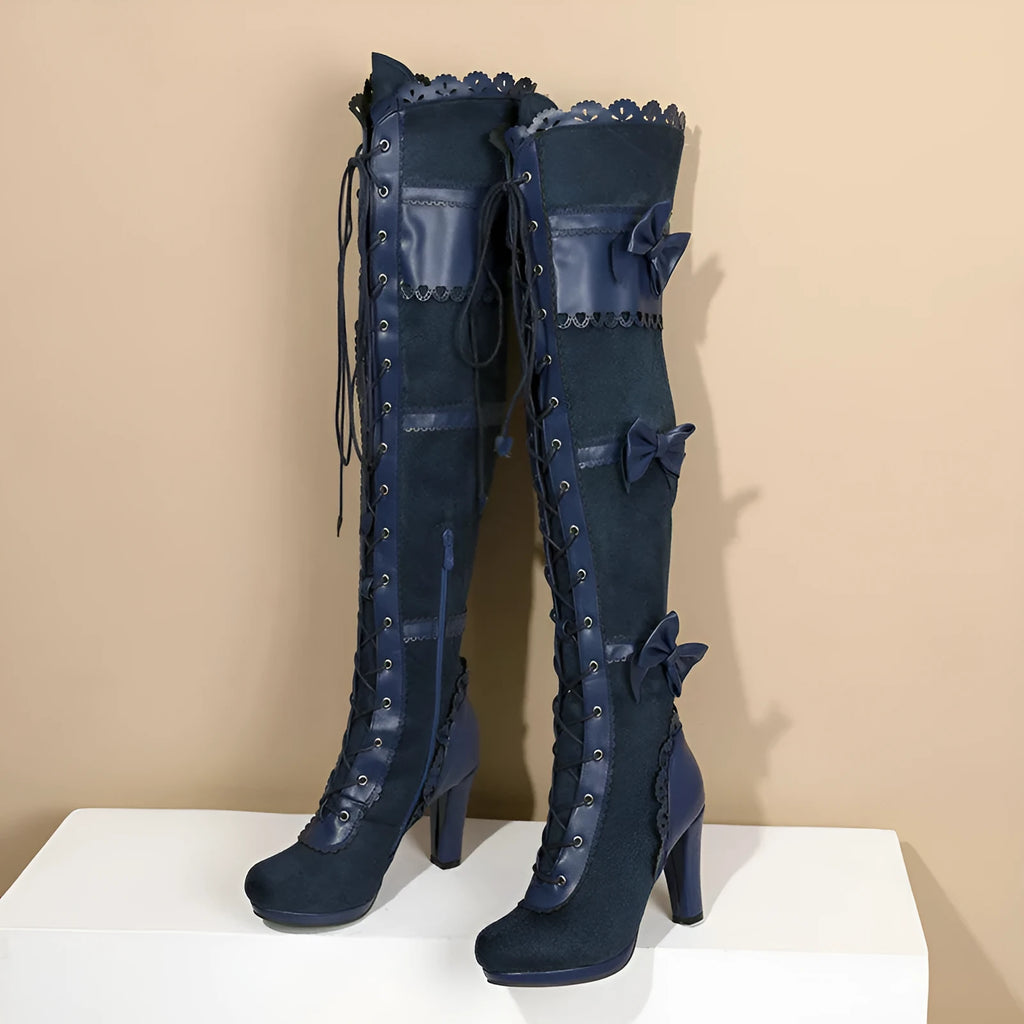 Women's high heel lace strap boots in black artificial PU with round toe and lace-up front