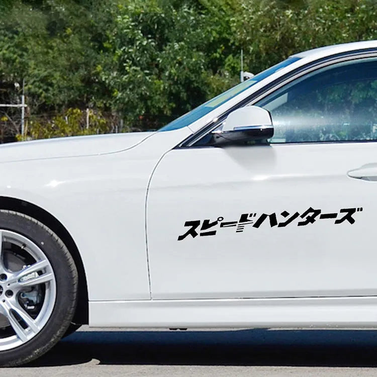Black and white Japanese reflective car stickers measuring 35x35cm