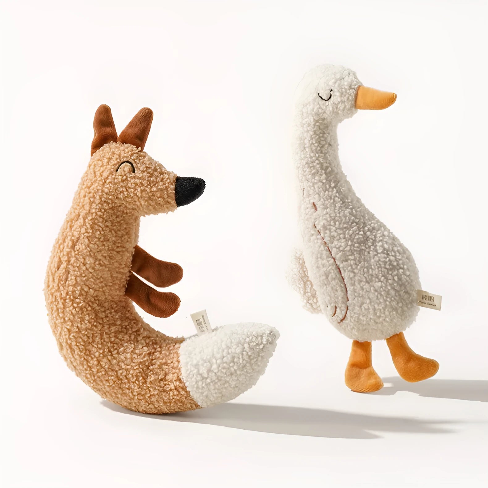 Cartoon fox and duckling pet chew toys with sound paper inside, made from teddy velvet fabric