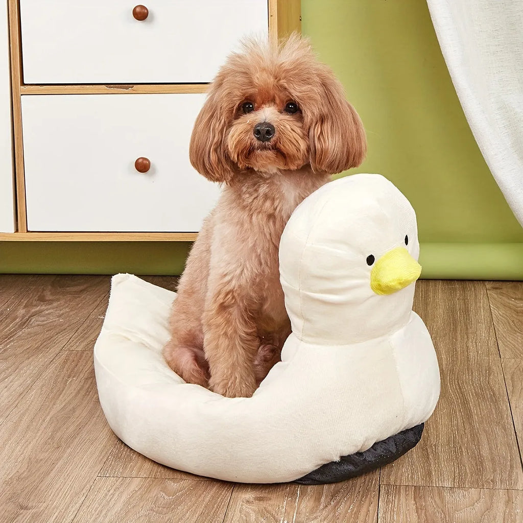 Blue duck-shaped fluffy pet bed for small dogs and cats on a floor