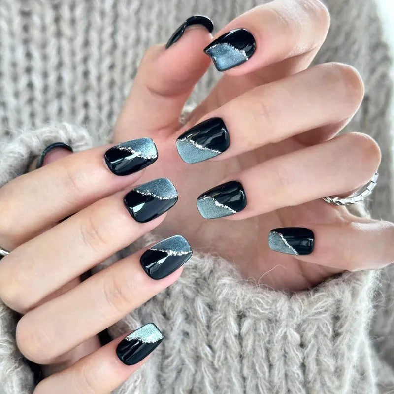 Press-on false nail kits showing multiple sets with assorted colours and adhesive tabs