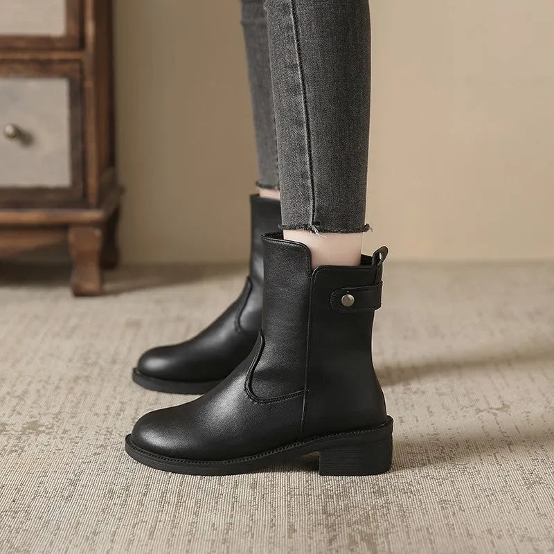 Women's black side zip low heel boots with round toe design