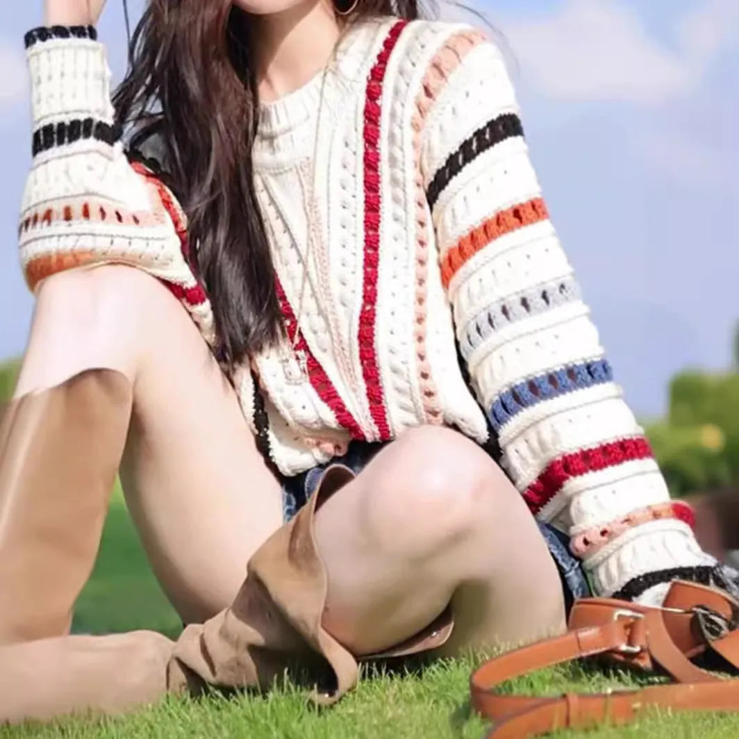 Colourful rainbow striped loose fit pullover sweater with batwing sleeves and hollow knit texture