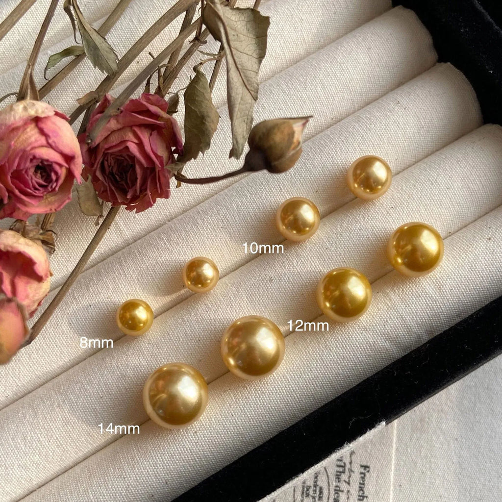 Large pearl stud earrings with geometric star design in silver with various pearl size options