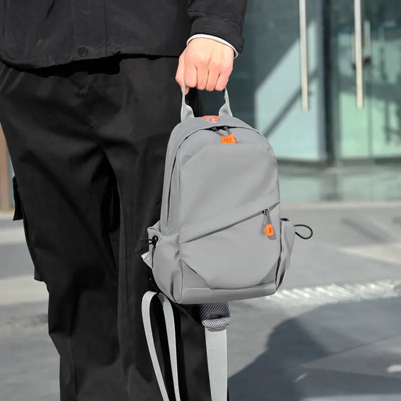 Mens casual single shoulder crossbody bag in waterproof polyester, black and grey colours
