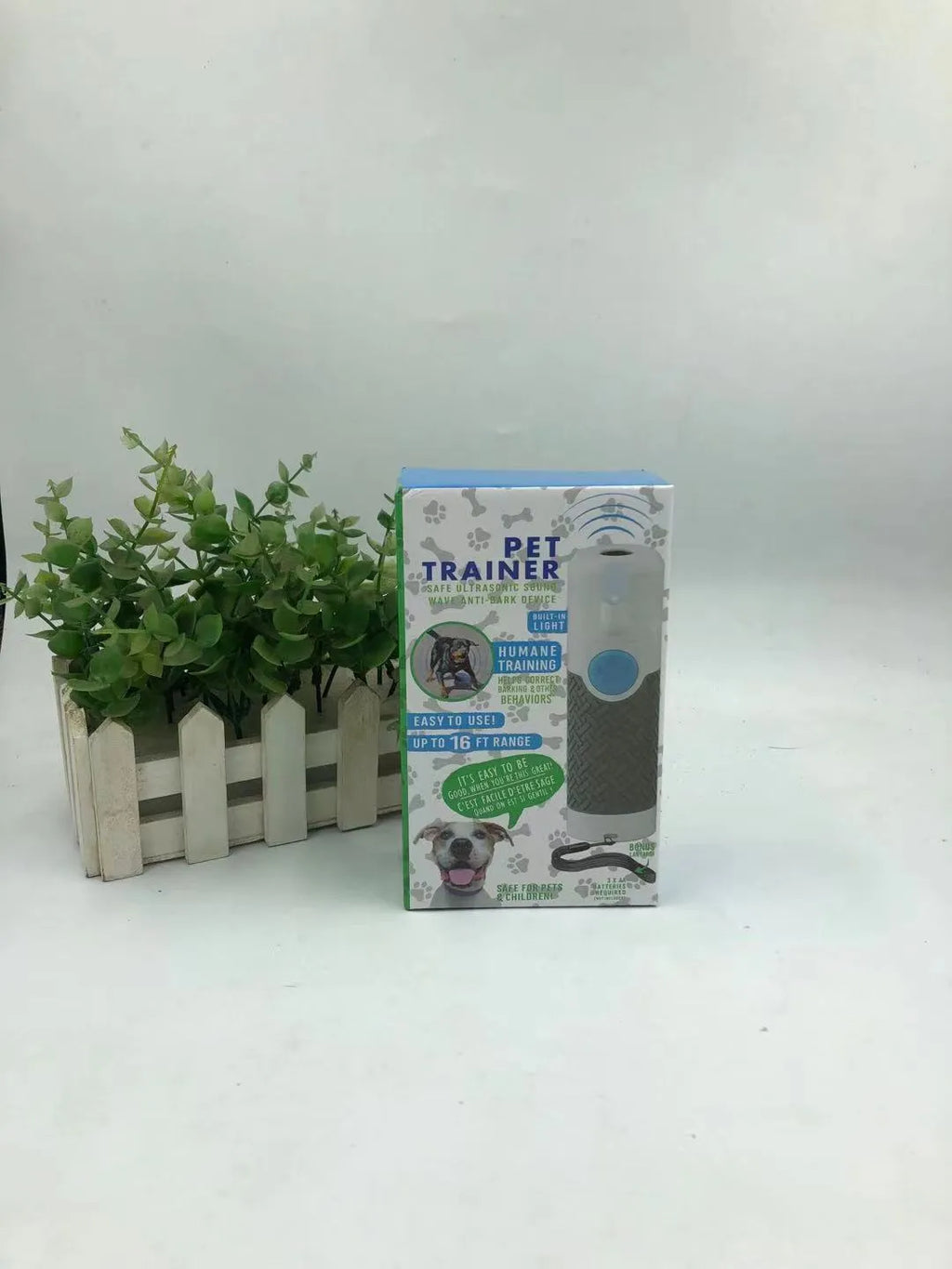 White ABS plastic handheld ultrasonic dog trainer for barking control