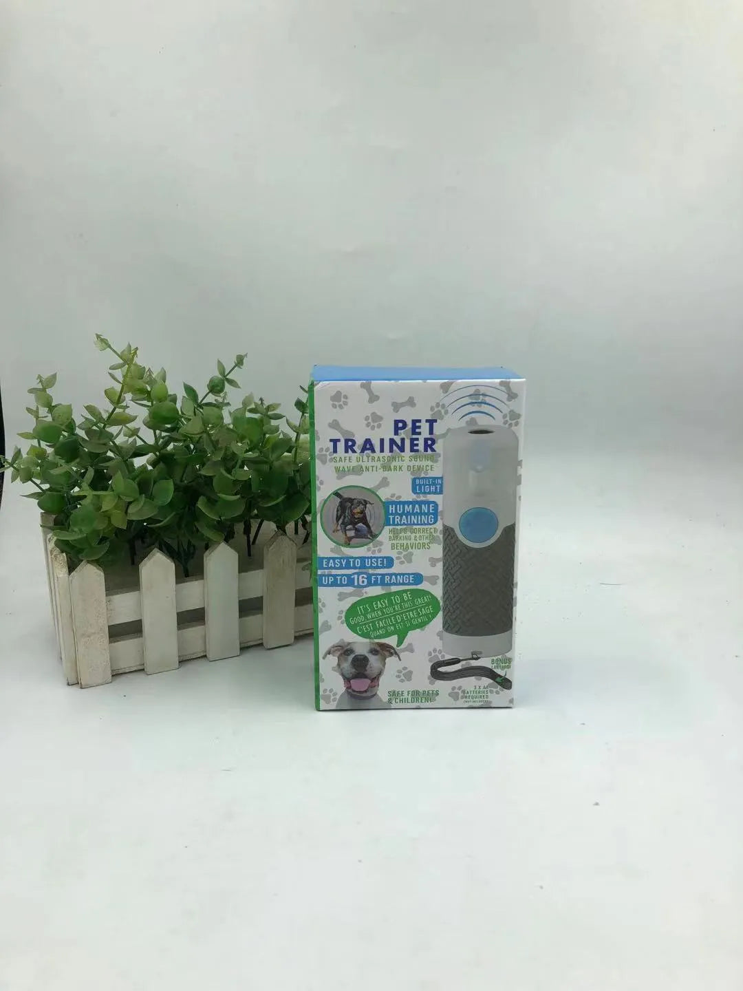 White ABS plastic handheld ultrasonic dog trainer for barking control