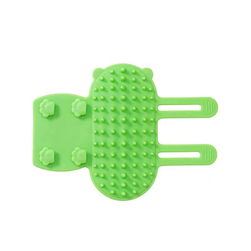 Adjustable silicone cat scratching brush mounted on table leg with rounded comb teeth for grooming