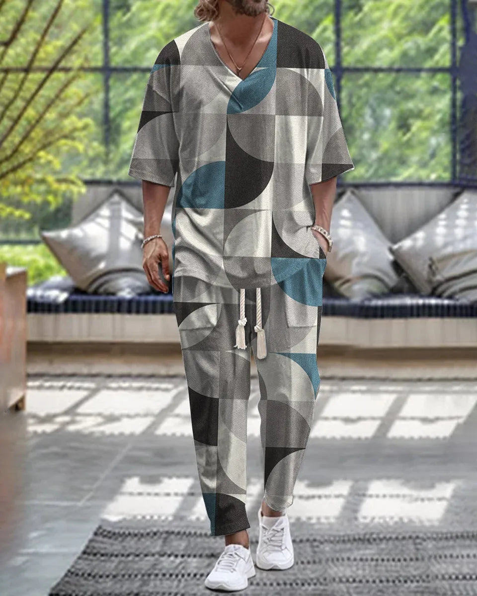 Women's grey V-neck cropped sleeve tracksuit set with matching trousers on a hanger