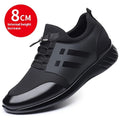 Men's black casual height increasing shoes with chunky heel and round toe in leather, mesh, or Lycra.