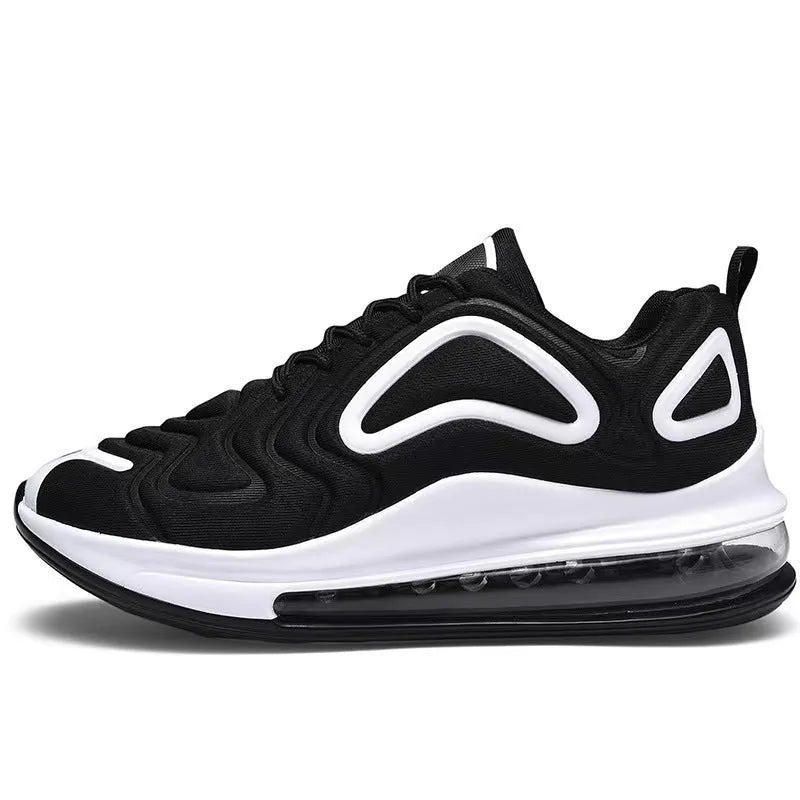 Men's black lace-up sneakers with thick sole and round toe on a white background