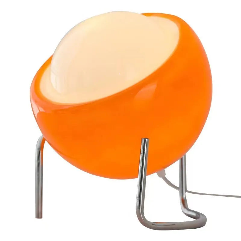 Medieval cream style USB table lamp with glass shade and tricolor light options on a bedside table