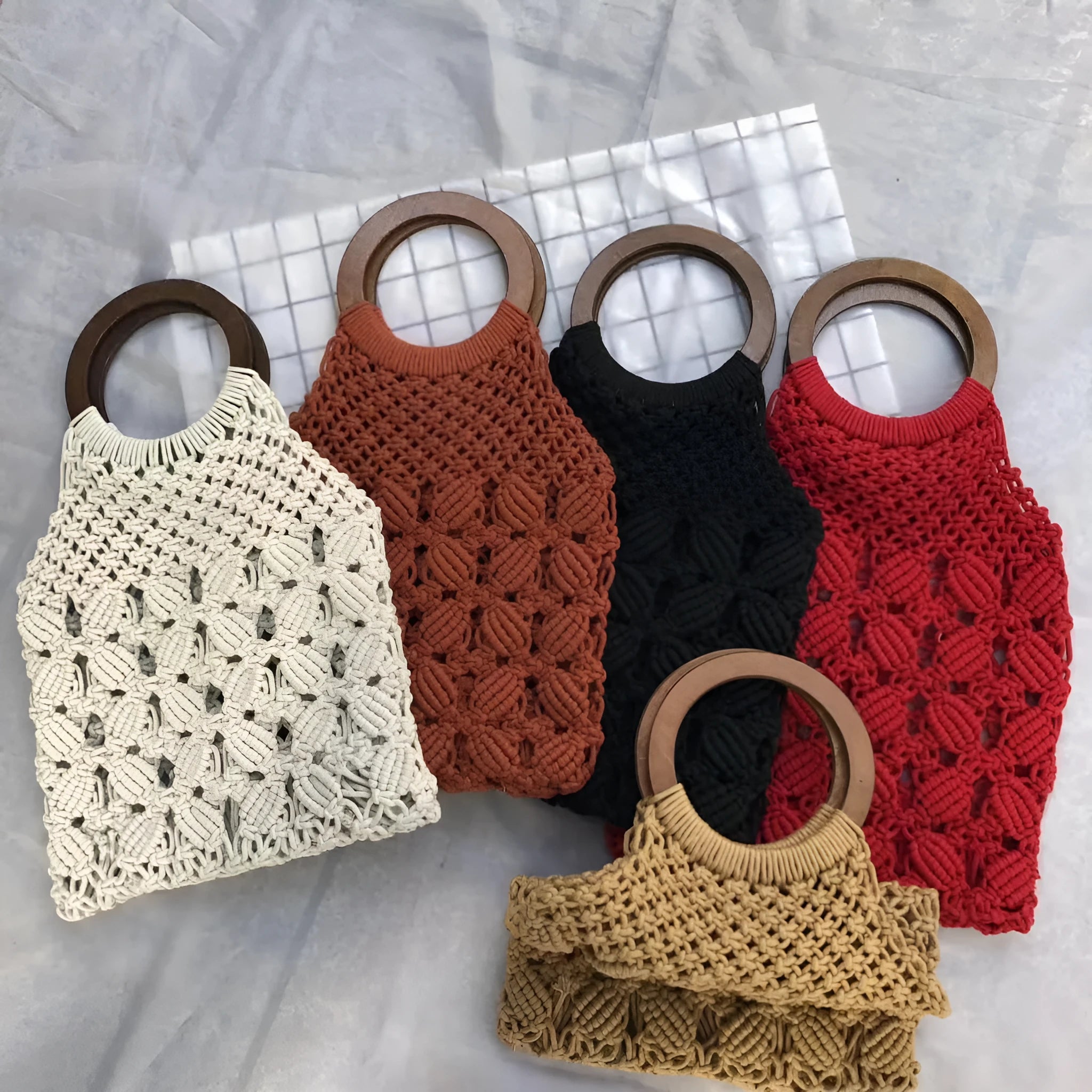 Handmade rope straw shoulder bag in solid colour with hard handle and cotton lining