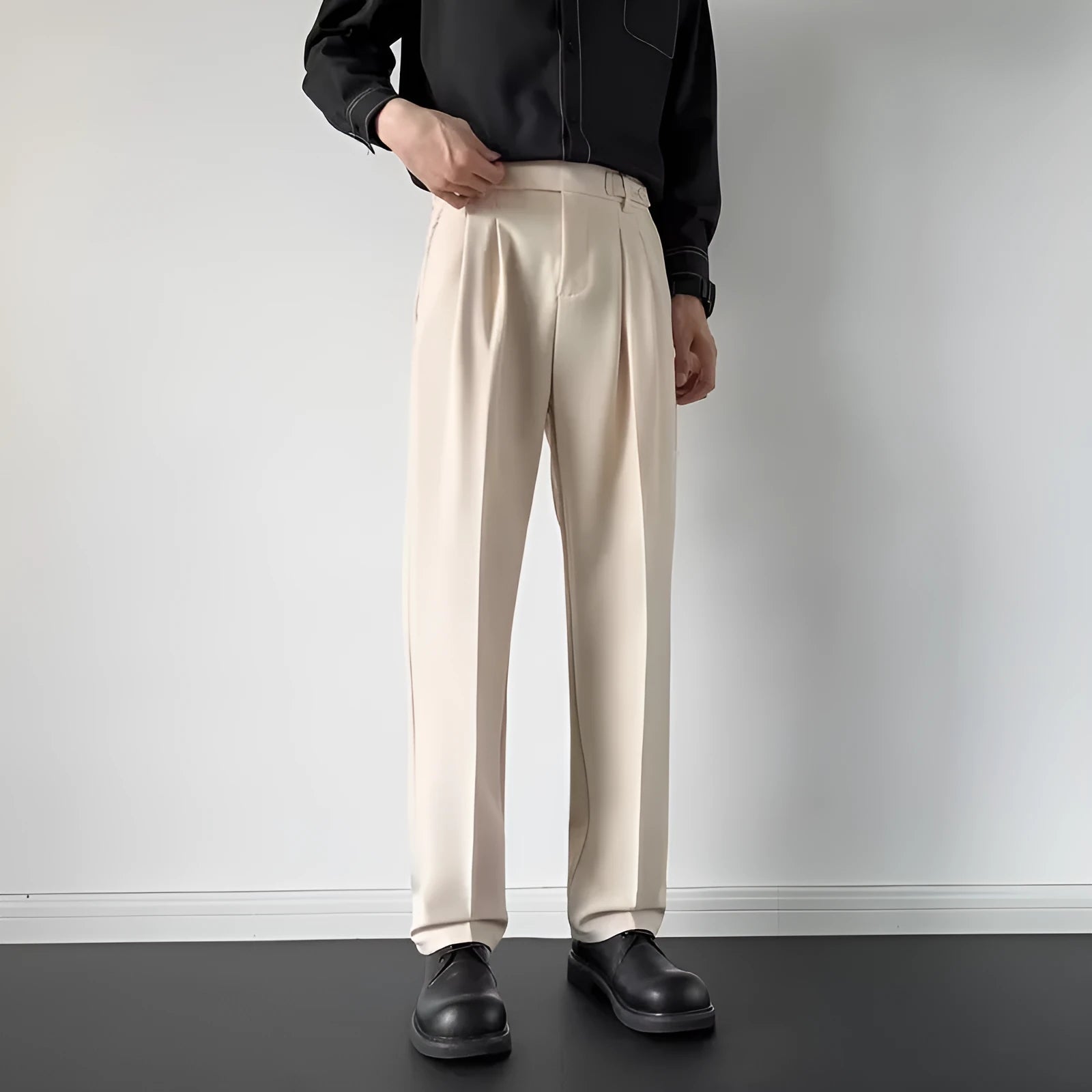Men's straight loose fit suit pants in apricot and black colours.
