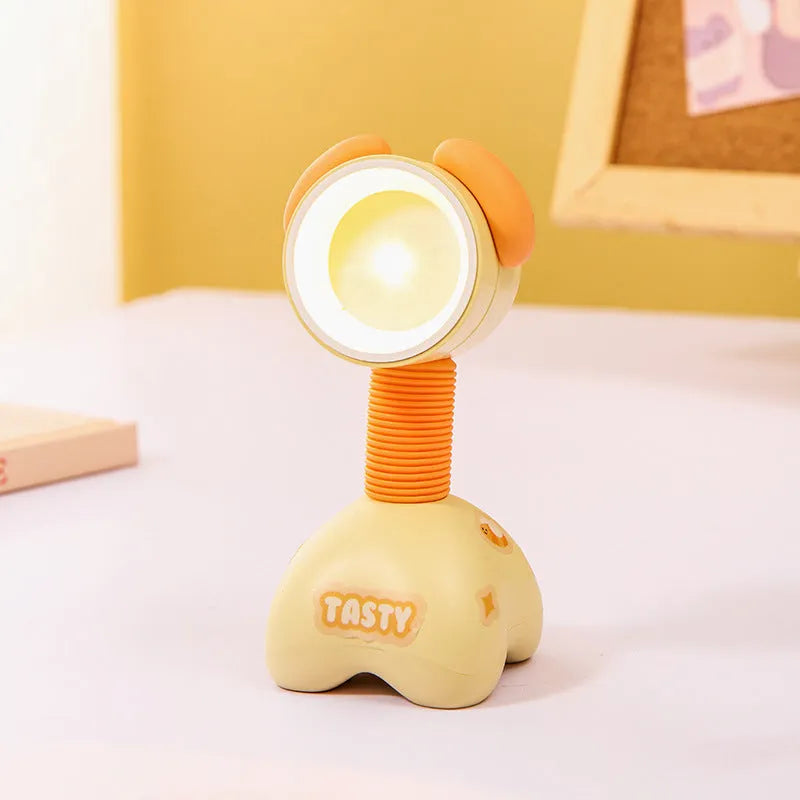 DIY cartoon magnetic small night lamp in assorted animal styles and colours on a desktop.