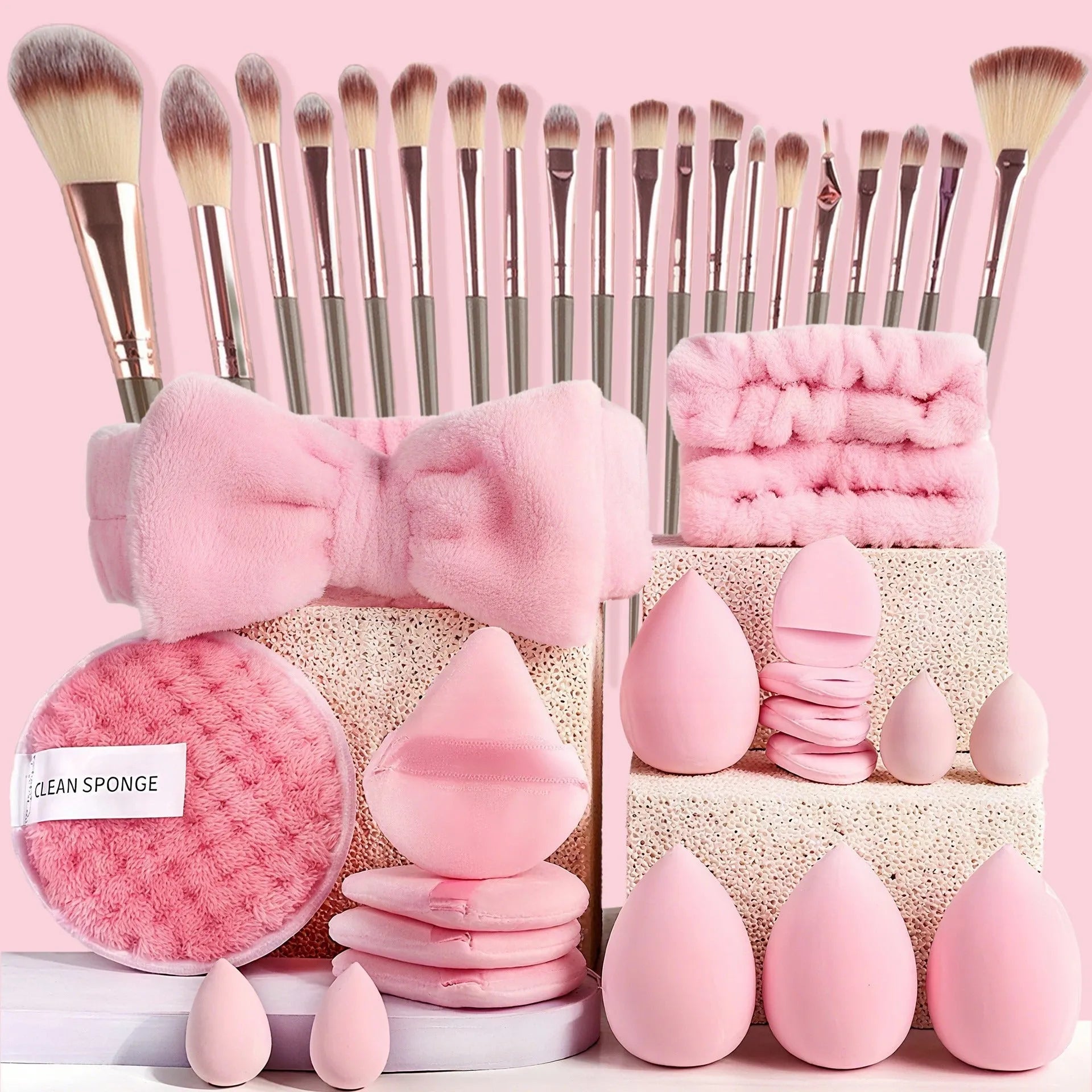 40-piece makeup sponge set in coffee brown, pink, and purple on white background