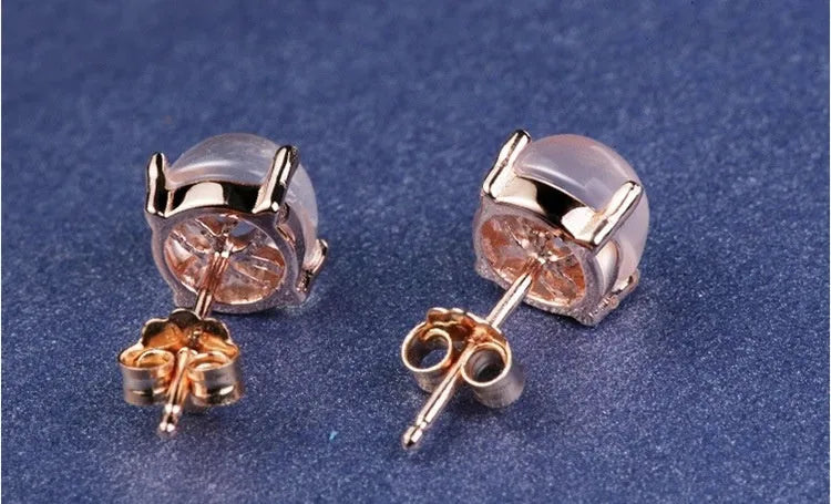 Women's rose gold drop shape stud earrings with crystal inlay detailing in Korean style