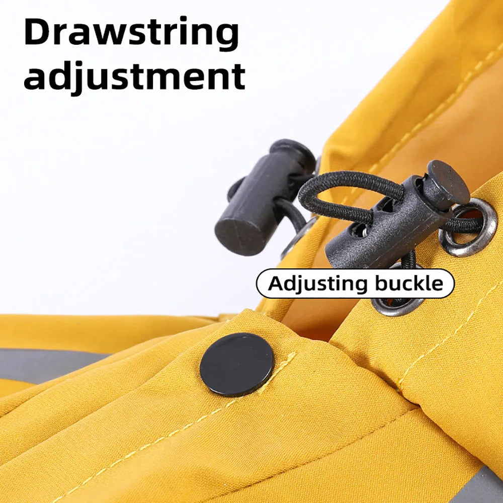 Waterproof dog raincoat with hood, reflective strips, and four-leg design on a small dog