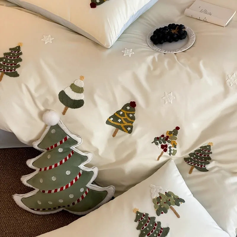 Pure cotton four-piece bedding set with embroidered Christmas tree and towel pattern in cream blue or green.