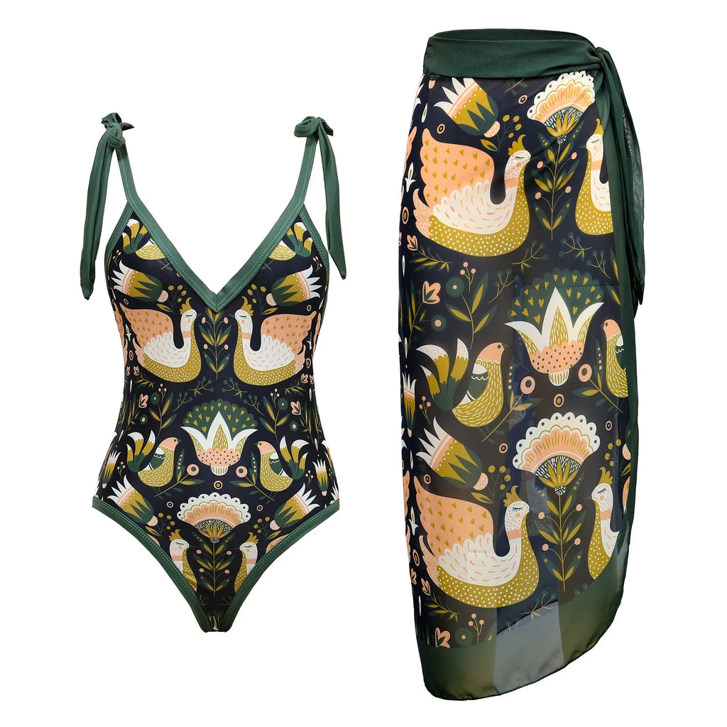 Women's solid colour one-piece swimsuit with spaghetti straps and a matching skirt laid flat.