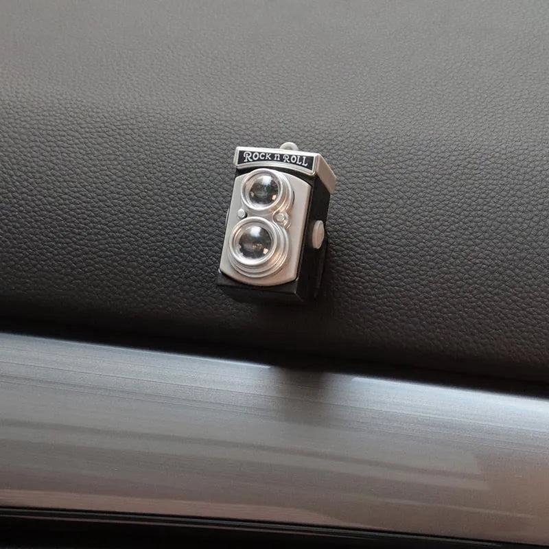 Set of four retro camera dot design plastic adhesive hooks for car interior, each measuring 4.2cm by 2.5cm.