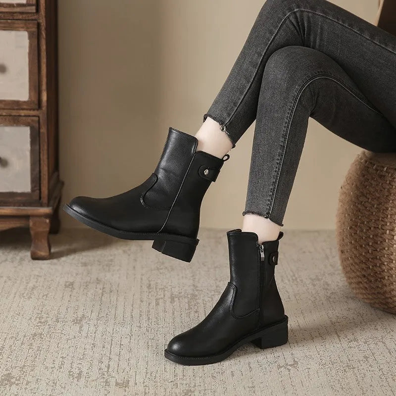 Women's black side zip low heel boots with round toe design