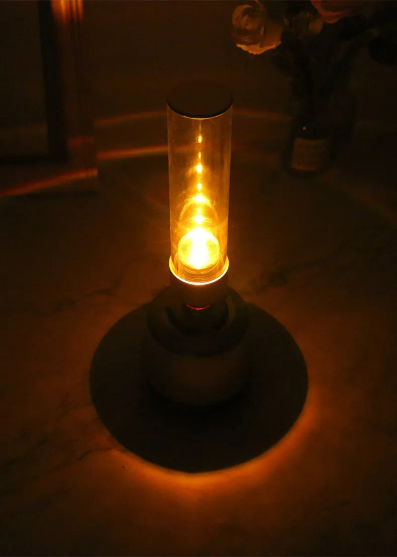 White silver Bluetooth speaker night light with candlelight effect and modern simple design