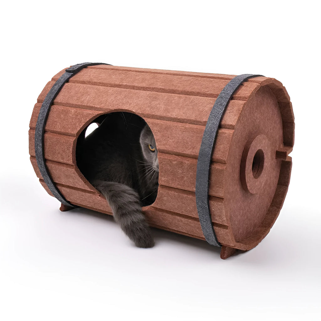 Assembled wine barrel shaped cat bed made from three grey polyester felt panels with binding straps.
