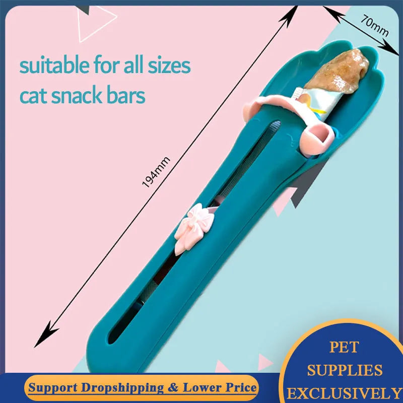 Green and pink pet food extrusion scoop with a squeezer dispenser for cat and dog treats