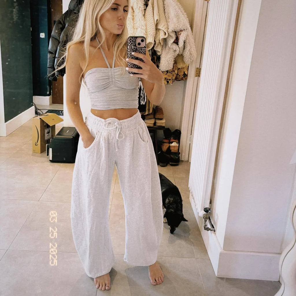 Cotton cropped sweatpants with elastic drawstring waist in loose street fashion style