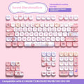 Sweet cotton candy gradient mechanical keyboard keycaps showing pink to blue colour transition
