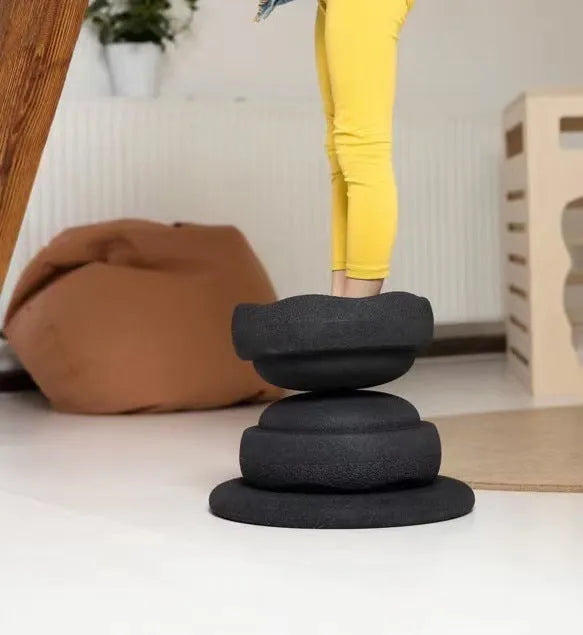 Plastic surf-style balance board with wood-grain finish for children aged 4 to 6 years.