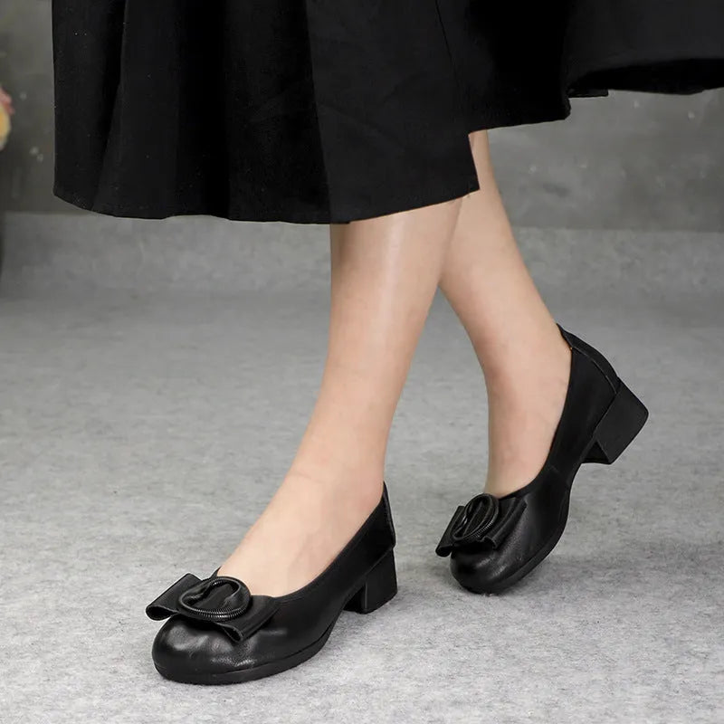 Low-cut genuine cowhide leather women's mid heel slip-on round head pumps in black wedge heel style