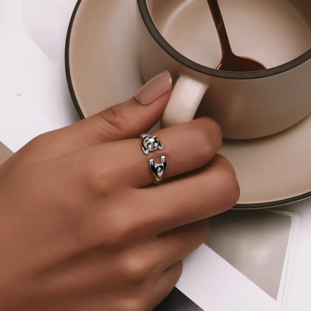 Sterling silver adjustable panda ring with white gold plating showing open bracelet design