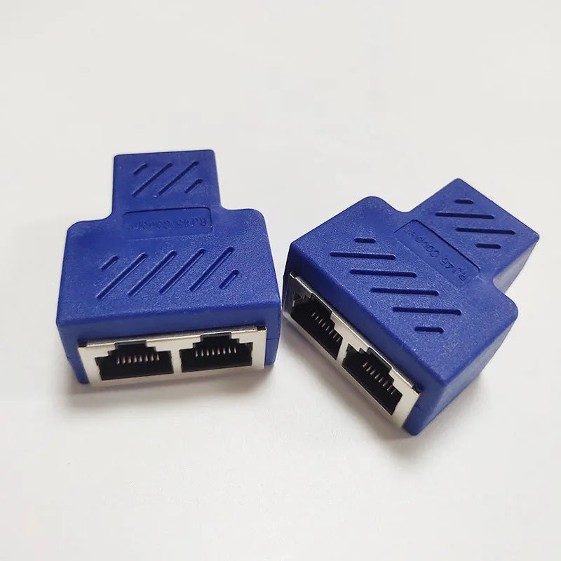 White RJ45 network cable splitter showing one male plug and two female Ethernet ports.