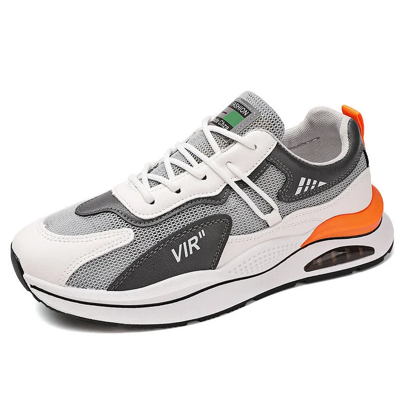 Men's grey and black mesh running shoes with round toe and mid-top design on white background