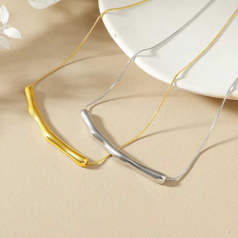Women's pleated titanium steel necklace in gold and steel electroplated finishes