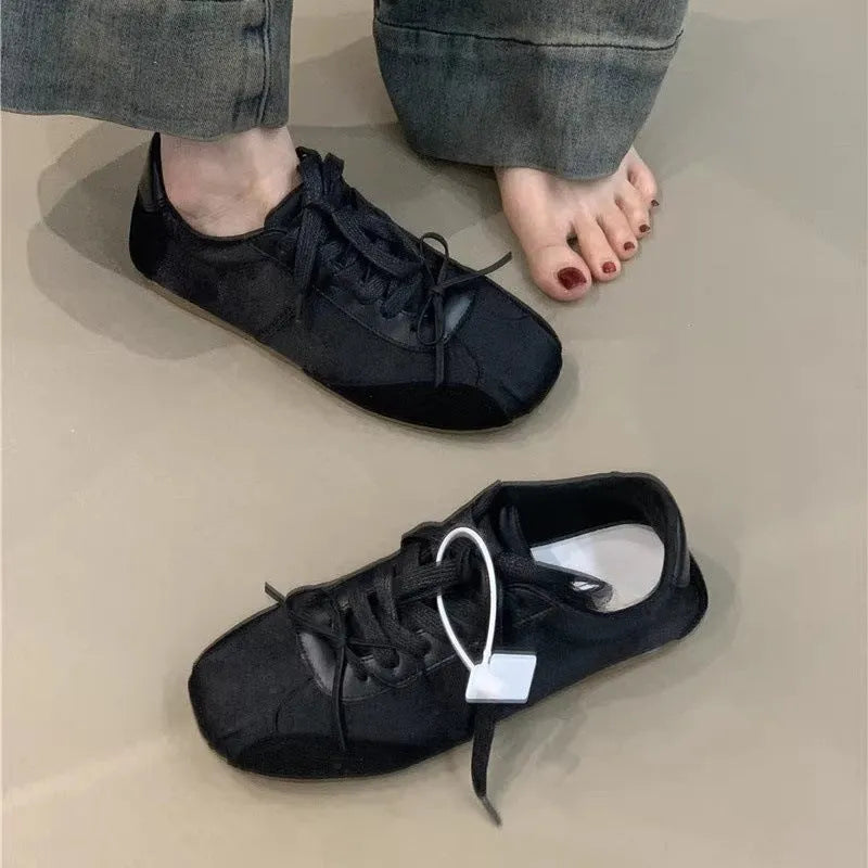 Girlish style bow white sneaker for women, low-top round toe, black colour option, side view