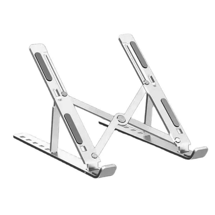 Silver aluminum folding laptop stand open on a desk with a laptop.