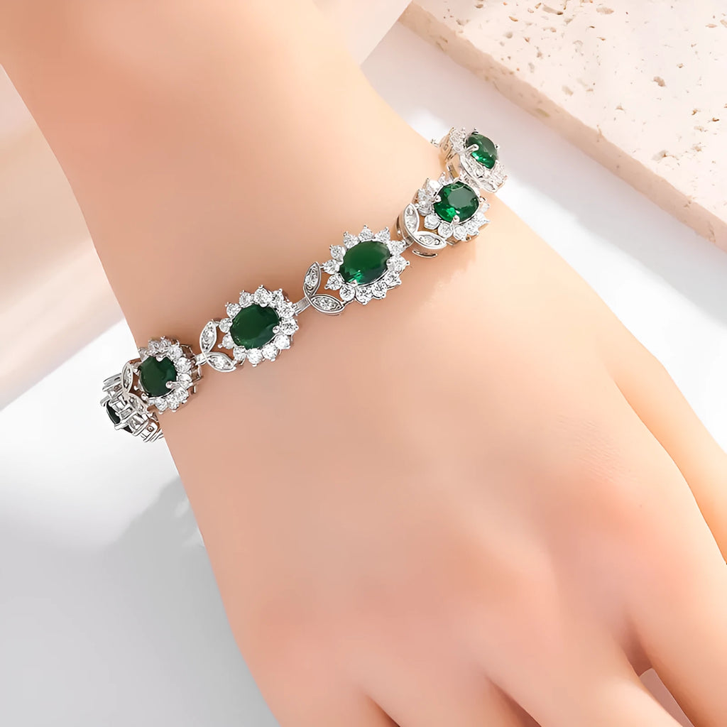 Women's bracelet with coloured zircon stone inlays in environmentally friendly alloy with electroplated finish