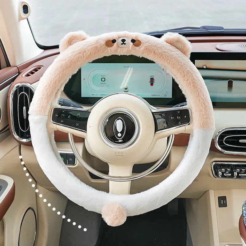 Plush rabbit fur steering wheel cover with embroidered cartoon design, shown fitted on a 38cm wheel.