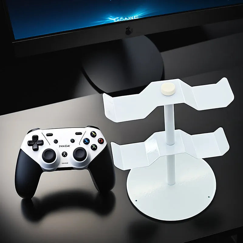 Metal e-sports headphone bracket in black with two layers on a gaming desk holding headphones