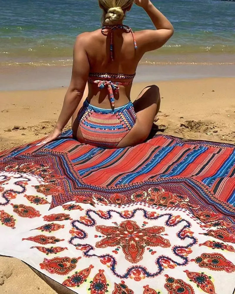 Women's three-piece swimsuit set showing high-waist cutout bottoms, sleeveless top, and coat in matching colour