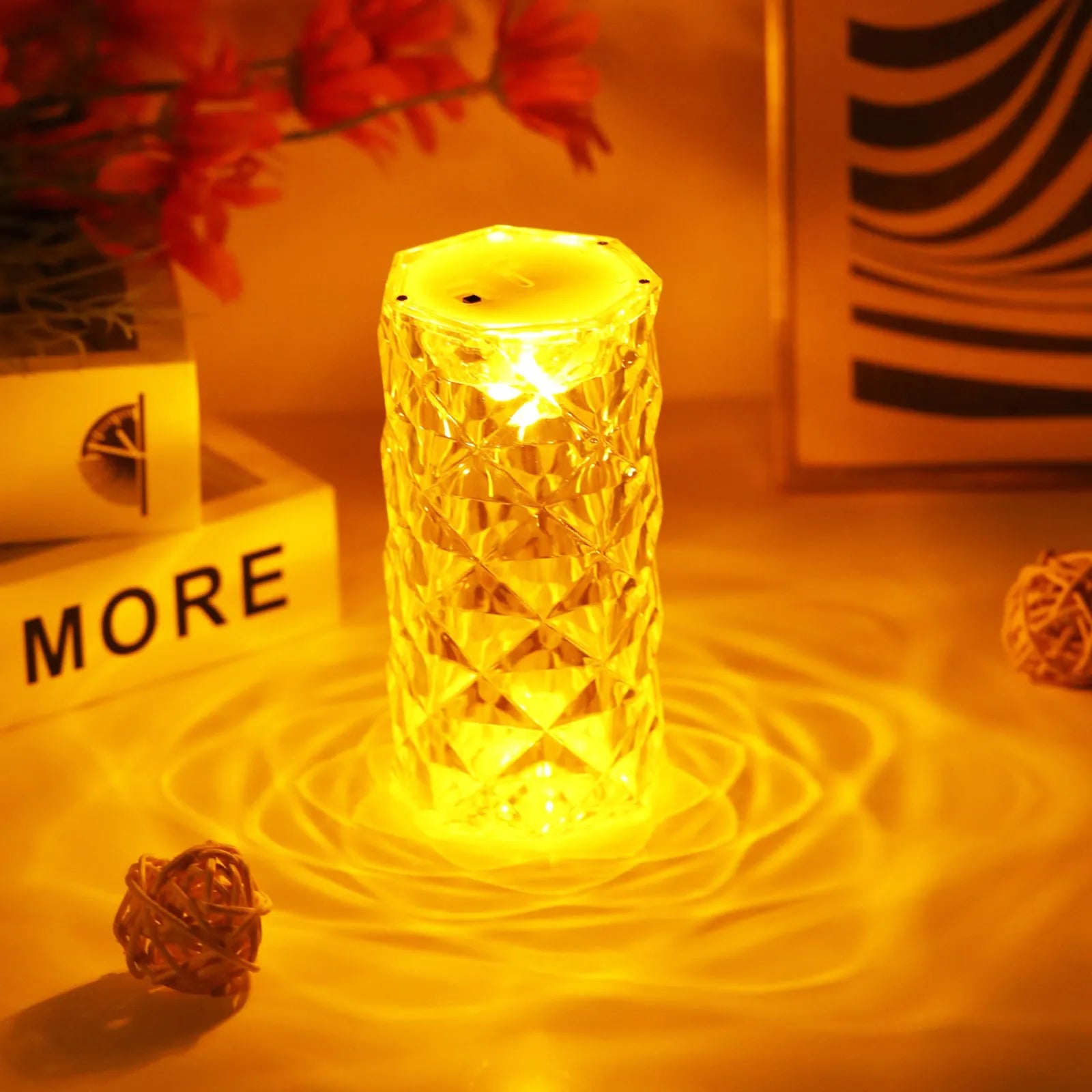 Clear acrylic crystal rose petal table lamp with plastic LED, warm white light, compact 12.2cm size on a desk