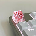 High transparency resin mechanical keyboard keycap with starry sky design in one of four colours.