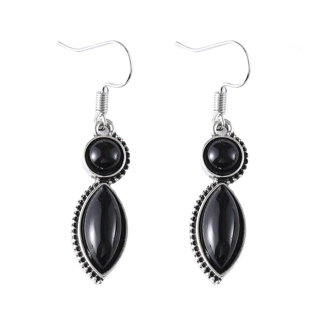 Geometric vintage earrings with black and purple gemstone accents in bohemian style